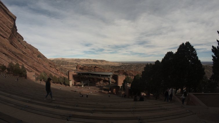 Image of a dark canyon with cloudy sky