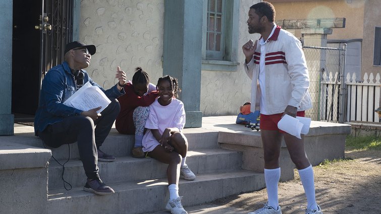 Director Reinaldo Marcus Green talking to the actors on the set of the film King Richard
