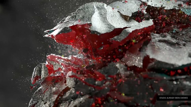 Redshift 3D image with splashing colors of red and silver