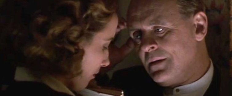 Anthony Hopkins stares at Emma Thompson in the film The Remains of the Day