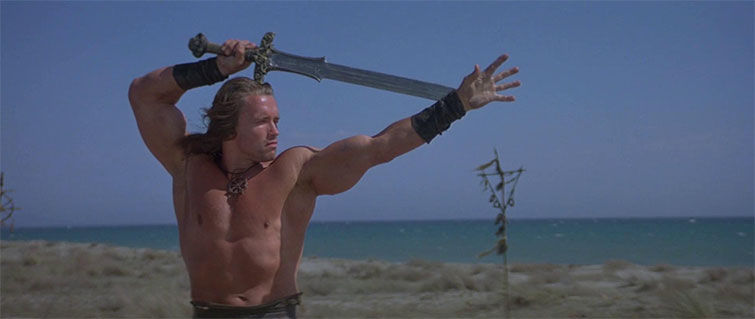 Scene from the film Conan the Barbarian with the hero wielding a sword