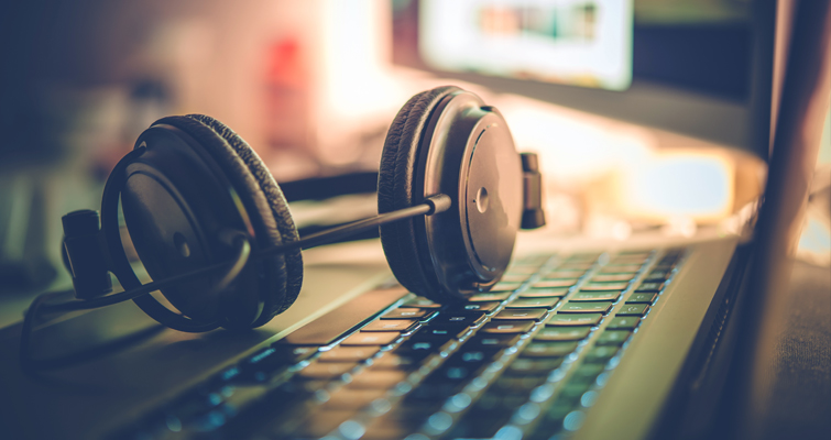 Closeup of headphones on a keyboard