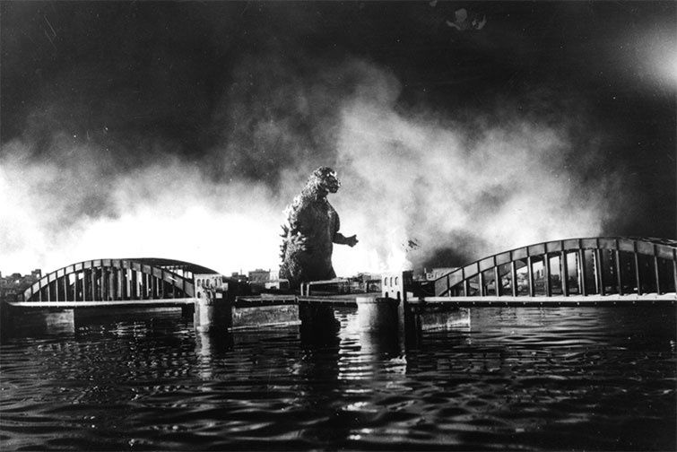 Godzilla walking from the sea into the city in the 1954 film Godzilla