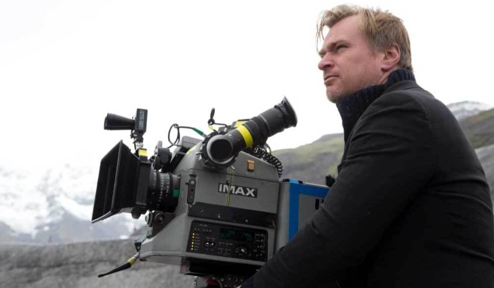 Christopher Nolan on set filming in outdoor location