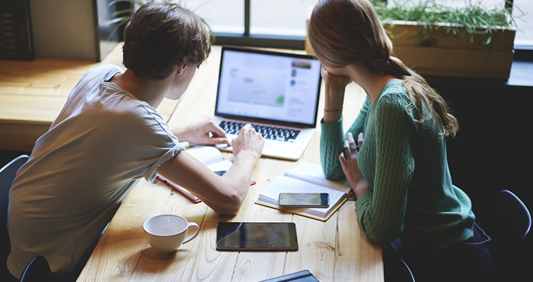 Students researching online preparing for a test