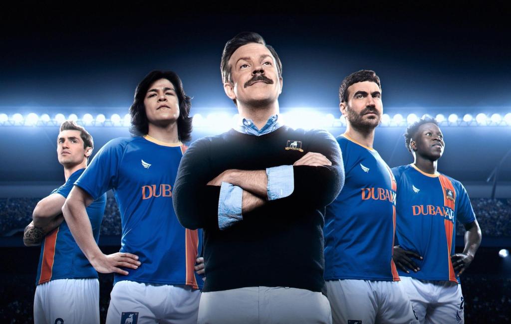 Promo picture of the cast of the comedy series Ted Lasso