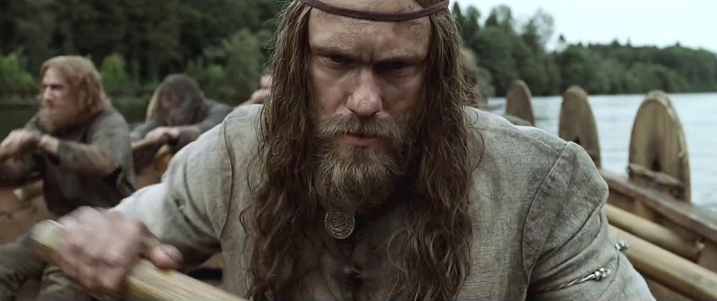 Alexander Skarsgard rowing on viking boat