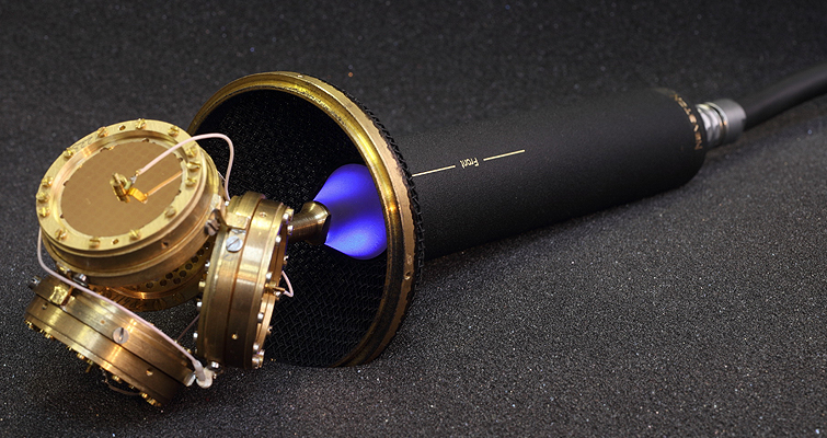 Nevaton VR ambisonic microphone resting on a black granular surface