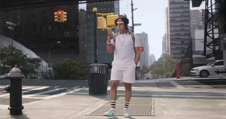 A Scene from Marvel's Spider-man: No Way Home with Flash standing on the street corner. 