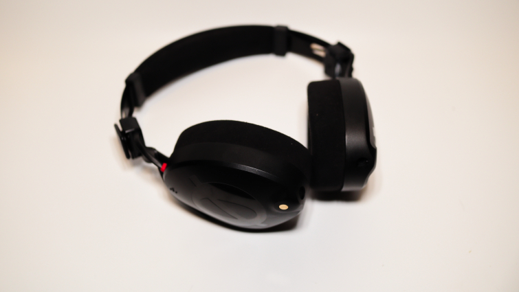 Black NTH-100 headphones against a creamy white backdrop