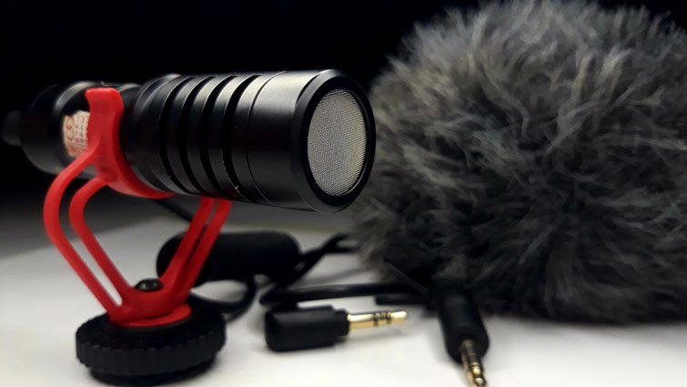 Closeup of shotgun microphone for camera and smartphone